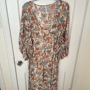 gorgeous summer maxi dress from free people for a wedding guest or vacation